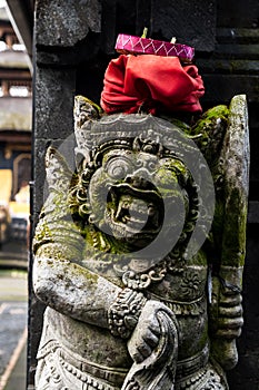 Stone Statue and sacrificial