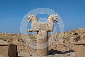 Stone statue of Zoomorphic griffin Twin Homa or Huma bird figures in the Persepolis in Shiraz, Iran. The ceremonial capital of