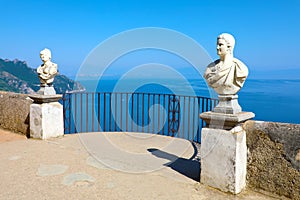 Stone statues on sunny Terrace of Infinity in Villa Cimbrone above the sea in Ravello, Amalfi Coast, Italy