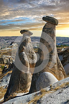 Stone statues Three Beauties on Urgup in Cappadocia, Turkey