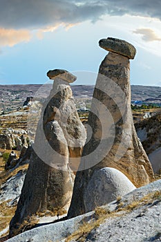 Stone statues Three Graces on Urgup in Cappadocia, Turkey photo