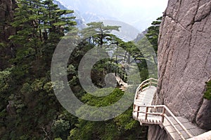 Stone Steep Steps . Trekking walking hiking Huangshan Mountain.