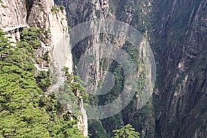 Stone Steep Steps . Trekking walking hiking Huangshan Mountain.