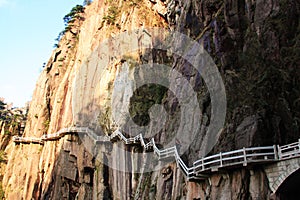 Stone Steep Steps . Trekking walking hiking Huangshan Mountain.