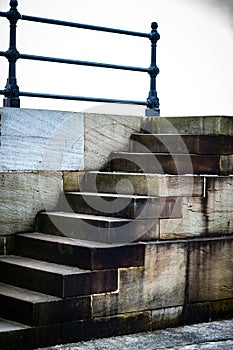 Stone steps and iron rail