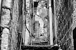 Stone steps between narrow streets of houses in Kotor