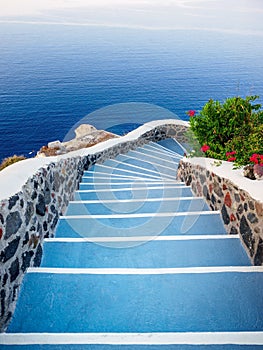 Stone steps, road to sea. Santorini island view. Greece