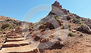 Stone steps and rocks landscape at Arches NP Delicate Arch trail