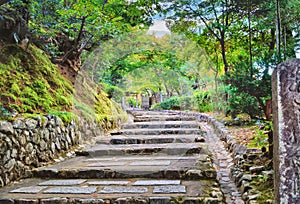 Stone steps in traditional japanese garden near Kyoto