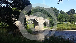 The Stone Strid Foot Bridge Across The River Wharfe In Yorkshire