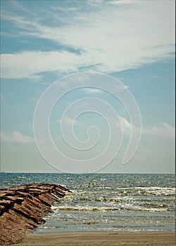 Jetty jutting out into the Gulf of Mexico photo