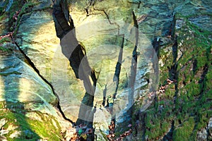 Stone structure of rock with moss