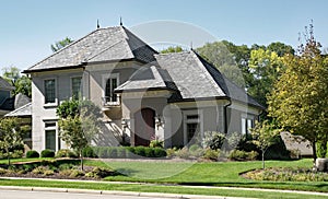 Stone & Stucco House with Slate Roof