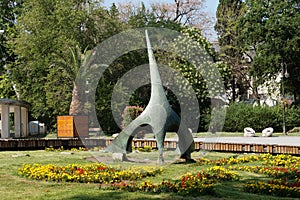 Stone sundial in city park close up