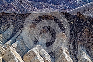 Stone Surface. Badlands, Zabriskie  Point Loop Death Valley National Park. Close Up, Texture, Geology