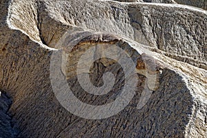 Stone Surface. Badlands, Zabriskie  Point Loop Death Valley National Park. Close Up, Texture, Geology