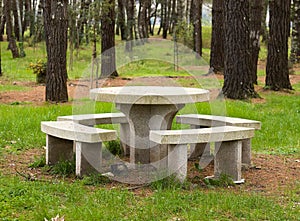 Stone table and benchs in a park