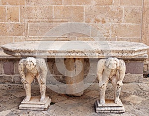 Stone table with Titans sculptures Our Lady of the Rocks Perast photo