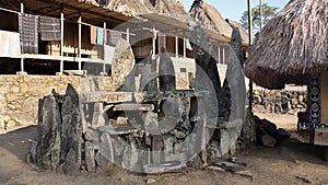 Stone tablets in Bena a traditional village with grass huts of the Ngada people in Flores.