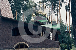 Stone temple in the forest on Ganina Pit - a complex of wooden Orthodox churches at the burial site of the last Russian