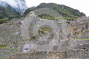 Stone terraces and a small house