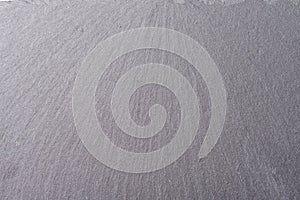 Stone texture background kitchen tray. Copy space background of dark grey stone.