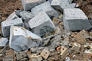 Stone texture of garbage brown bricks gray concrete chunks