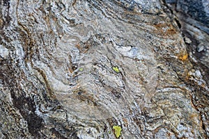 Stone texture, granite surface. Colored rock pattern background.