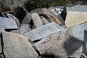 Stone with tibetian mantras Tibet sanscrit