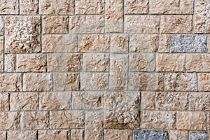 Stone tiled facade wall of a building