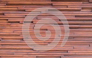 Stone tiles on the wall. The wall is made of ceramic  granite tiles. The structure of the stone.