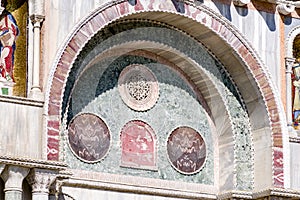 Tile stone made into an art display on St. Mark`s Basilica in Venice.