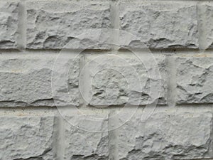 Stone texture to decorate the facade. Rectangular shape. Gray background