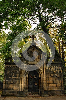 Stone tomb on Olsany Cemetery in Prague photo