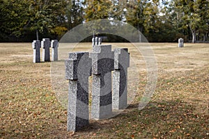 Stone tombstones in the German cemetery in the fall. Beautiful German cemetery near Kyiv. Many dead German soldiers of the dead