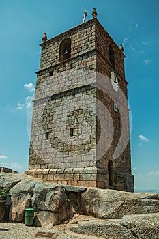 Stone tower with bell and clock in Monsanto