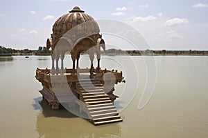 Stone tower in sacred Gadi Sagar lake