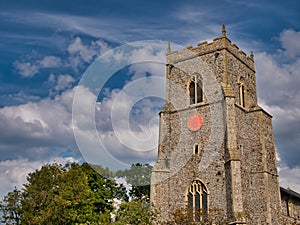 The stone tower of St Mary\'s Church in Brancaster, Norfolk, UK