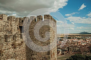 Stone tower walls and old buildings cityscape at the Castle of Trujillo