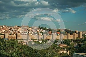 Stone towers on large wall over the hill encircling Avila