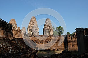 Stone towers of a medieval Khmer temple. Baray eastern Mebon