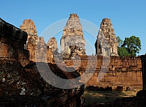 Stone towers of a medieval Khmer temple. Baray eastern Mebon