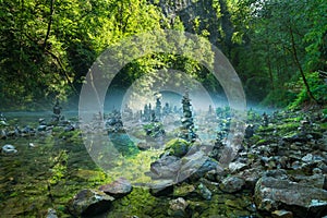 Stone towers in Vintgar gorge and Radovna river near Bled in Slovenia