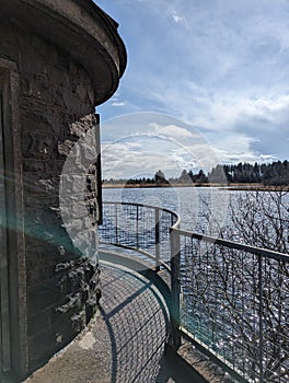 Stone turret overlooking serene lake