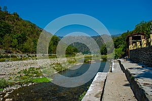 Stone under crystal clear water of  Ganga River