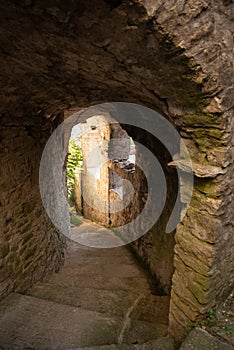 Stone underpassage and steps in a medieval village.