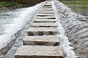Stone walkway cross stream