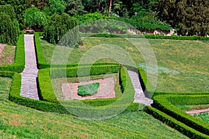 Stone walkway with hedge view from above on a maze.