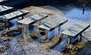 stone walkways over water ponds on metal struts levitate stone