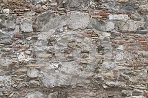 A Stone wall as background or texture. The background texture of the stone wall